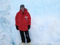 Jim next to an iceberg