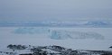 Two icebergs stuck in the sea ice