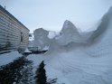 Cornice of blown snow next to Scott Hut